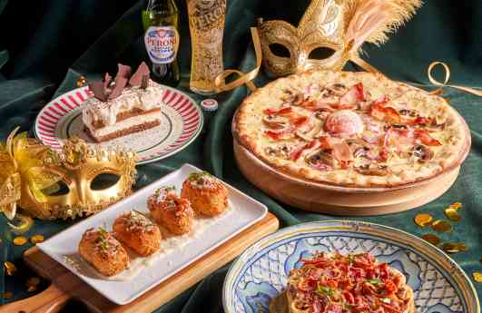 El Carnaval más veneciano se sienta a la mesa en Ginos